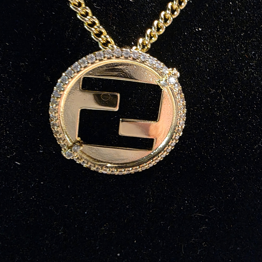 USED..UPCYCLED  Gold Fendi Zipper Pull Pendant With Crystals Necklace.